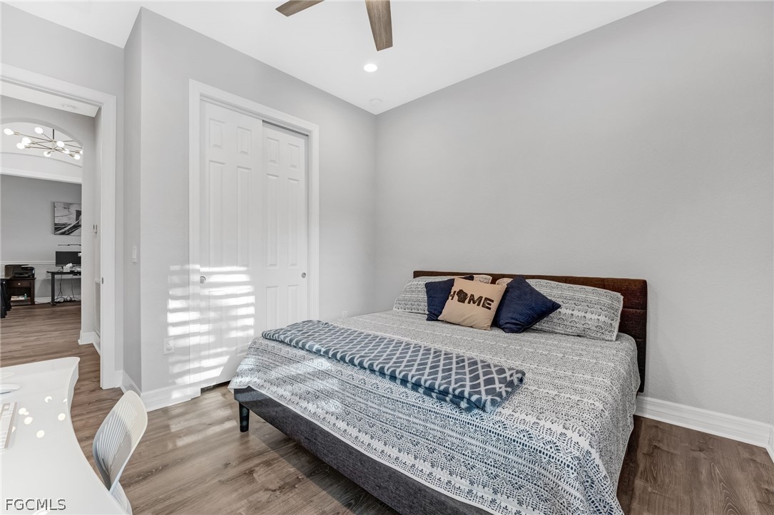 2999 Willow Ridge Court Fort Myers, FL 33905 - Photo 25 of 50 a large bed sitting in a bedroom next to a window