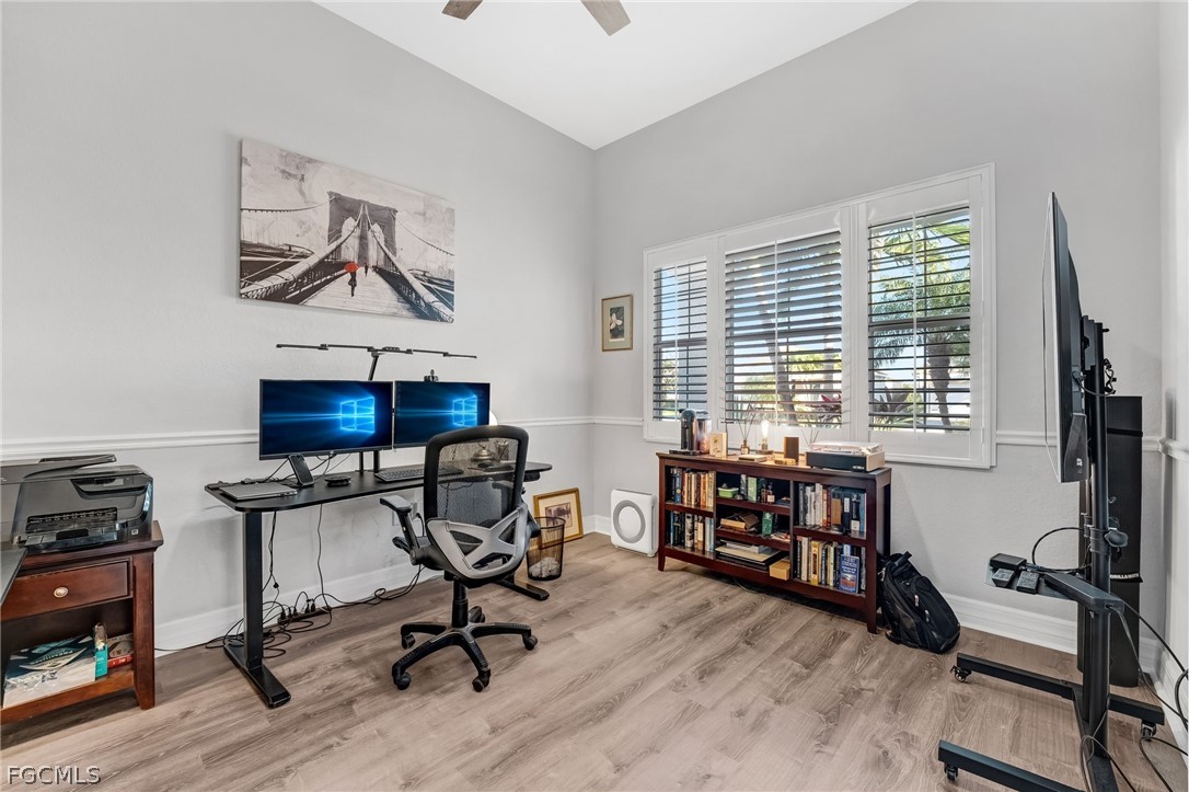 2999 Willow Ridge Court Fort Myers, FL 33905 - Photo 29 of 50 a view of a workspace with furniture and a window
