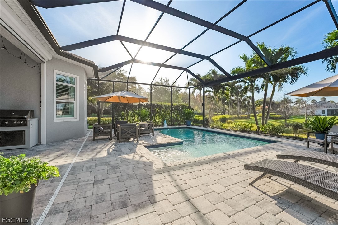 2999 Willow Ridge Court Fort Myers, FL 33905 - Photo 3 of 50 a view of a swimming pool with a patio