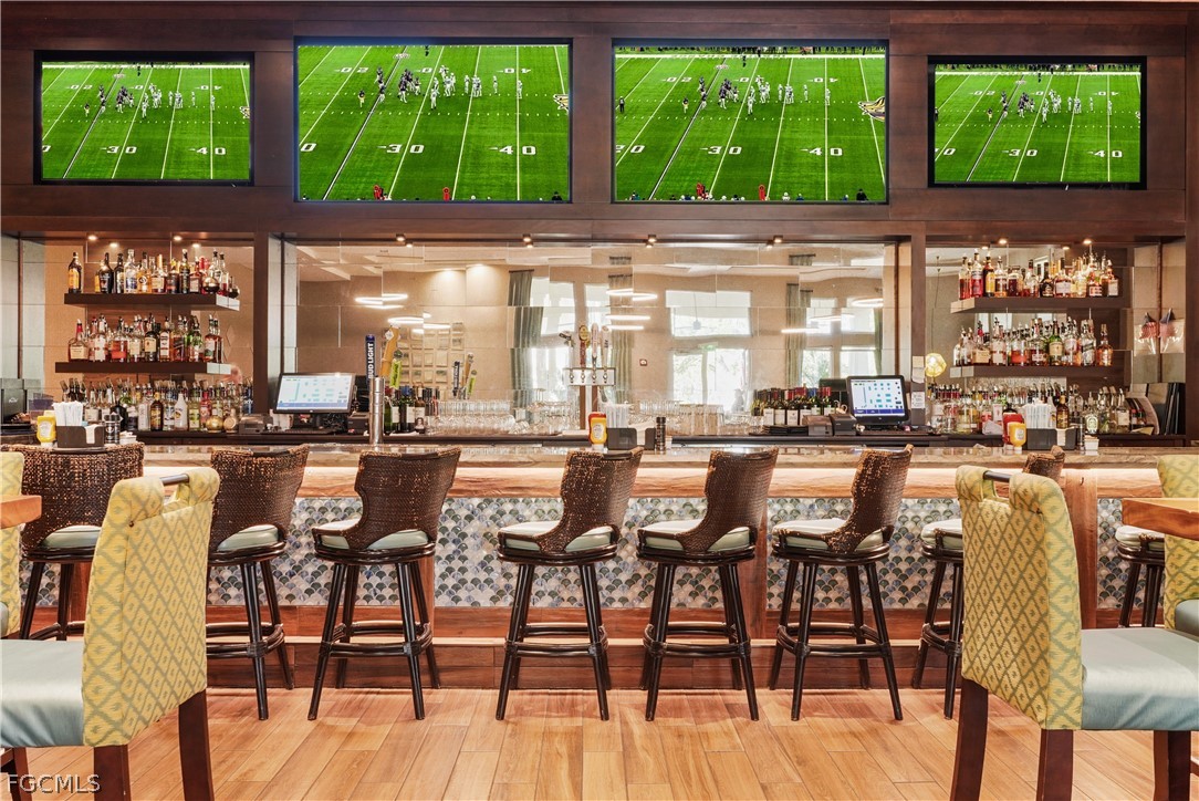 2999 Willow Ridge Court Fort Myers, FL 33905 - Photo 41 of 50 a dining area with chairs and outdoor view