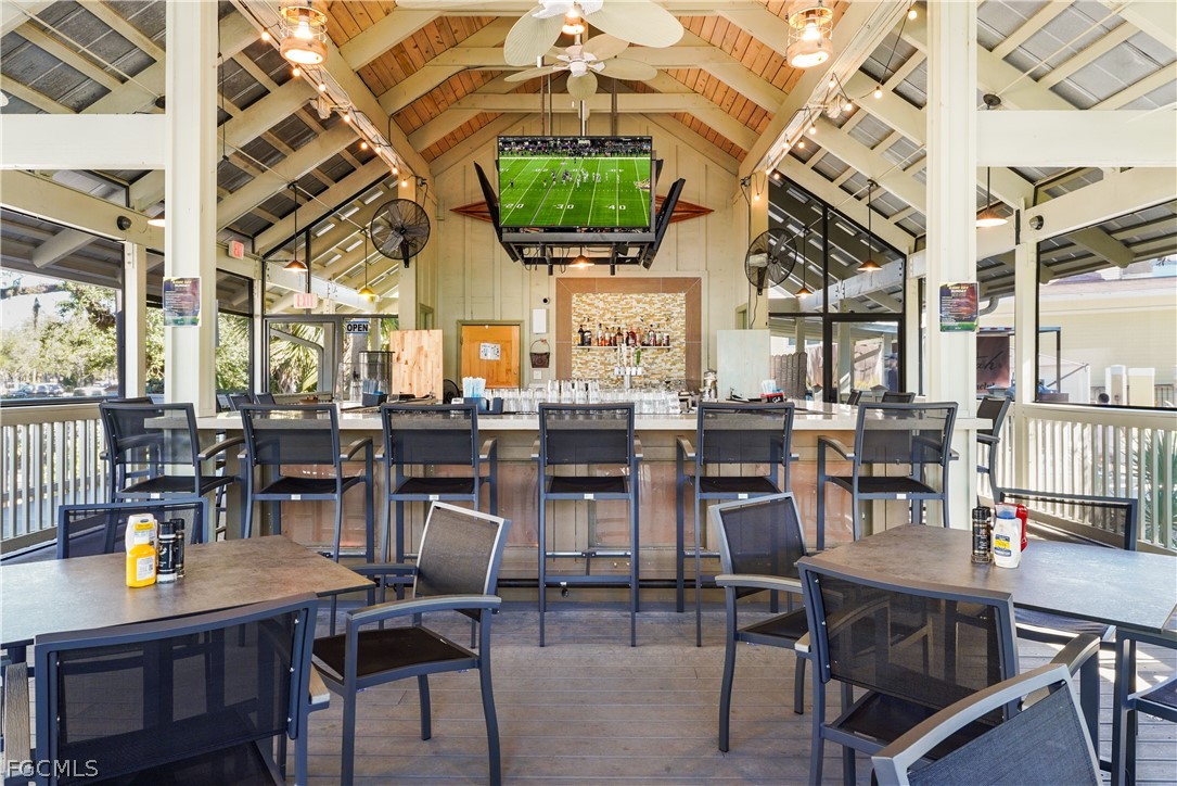 2999 Willow Ridge Court Fort Myers, FL 33905 - Photo 43 of 50 a dining room with lots of tables and chairs