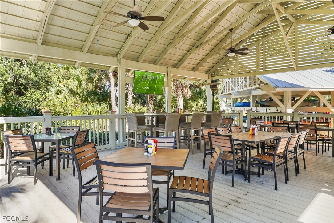 2999 Willow Ridge Court Fort Myers, FL 33905 - Photo 45 of 50 a view of a dinning tables and chairs in the patio
