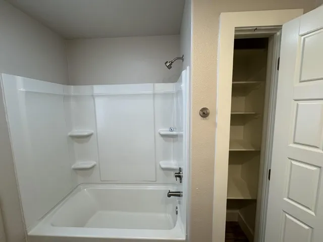 a bathroom with a bathtub