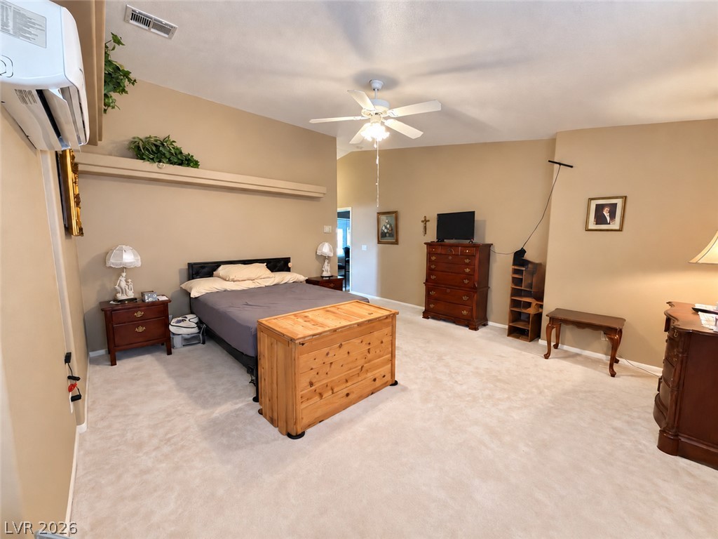5470 Grain Mill Road Pahrump, NV 89061 - Photo 16 of 80 Vaulted ceilings and soft wall-to-wall carpeting define this comfortable primary suite.