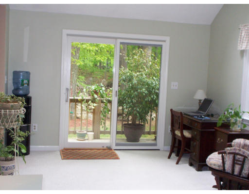 2 Parker Road Ashland, MA 01721 - Photo 14 of 29 a living room with furniture and a floor to ceiling window