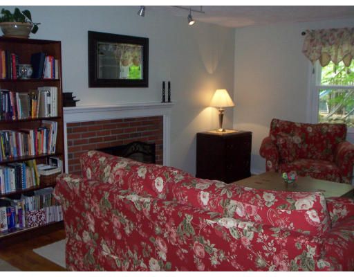 2 Parker Road Ashland, MA 01721 - Photo 17 of 29 a living room with furniture and a fireplace