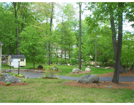 2 Parker Road Ashland, MA 01721 - Photo 2 of 29 a backyard of a house with lots of green space