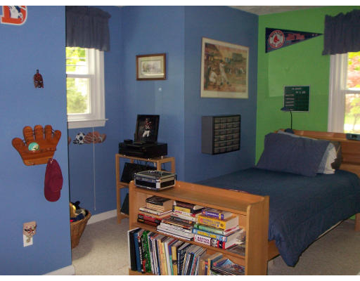 2 Parker Road Ashland, MA 01721 - Photo 22 of 29 a bedroom with a bed and a window
