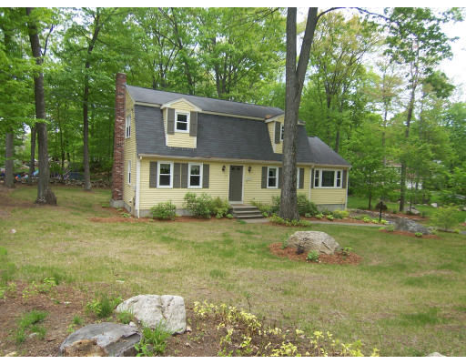 2 Parker Road Ashland, MA 01721 - Photo 23 of 29 a front view of a house with a yard