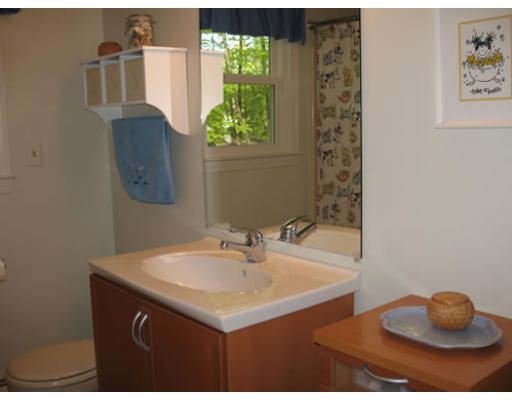 2 Parker Road Ashland, MA 01721 - Photo 27 of 29 a bathroom with a sink and a mirror