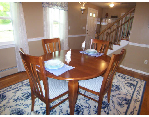 2 Parker Road Ashland, MA 01721 - Photo 4 of 29 a view of a dining room with furniture