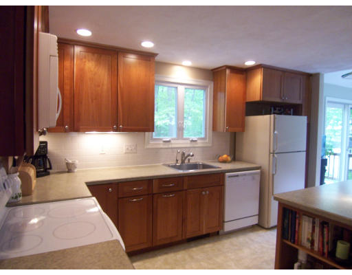 2 Parker Road Ashland, MA 01721 - Photo 8 of 29 a kitchen with a sink a refrigerator and window