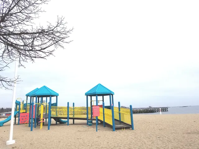 an outdoor space with patio furniture and white umbrellas