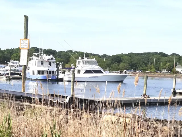 a view of a brick wall with a chair