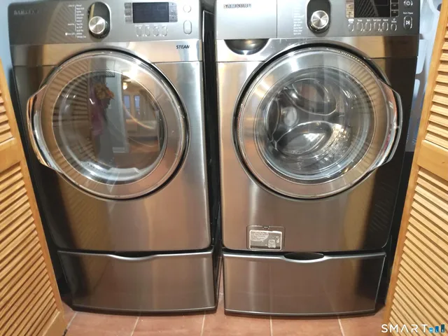 a view of washer and dryer in a utility room