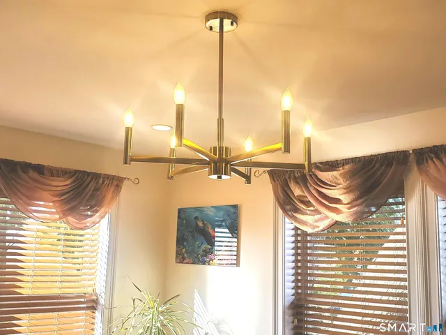 a lamp is on the corner of the street