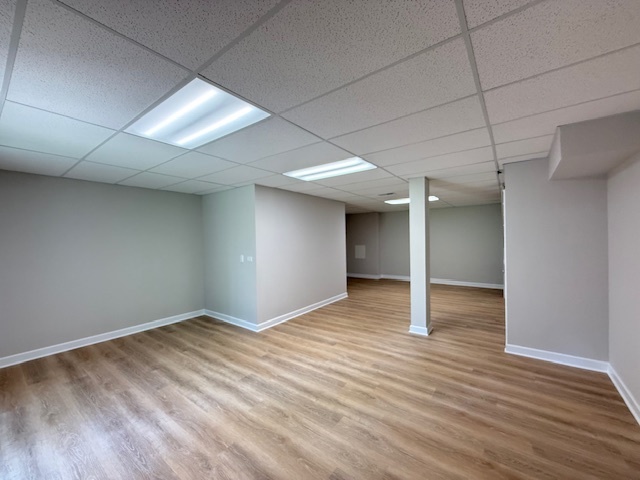 19W147 Ave Rue Royal Oak Brook, IL 60523 - Photo 14 of 16 a view of an empty room with wooden floor