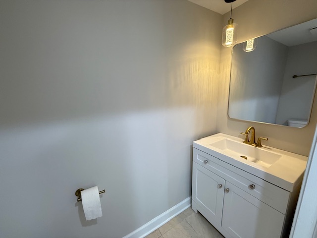 19W147 Ave Rue Royal Oak Brook, IL 60523 - Photo 7 of 16 a bathroom with a sink and a mirror