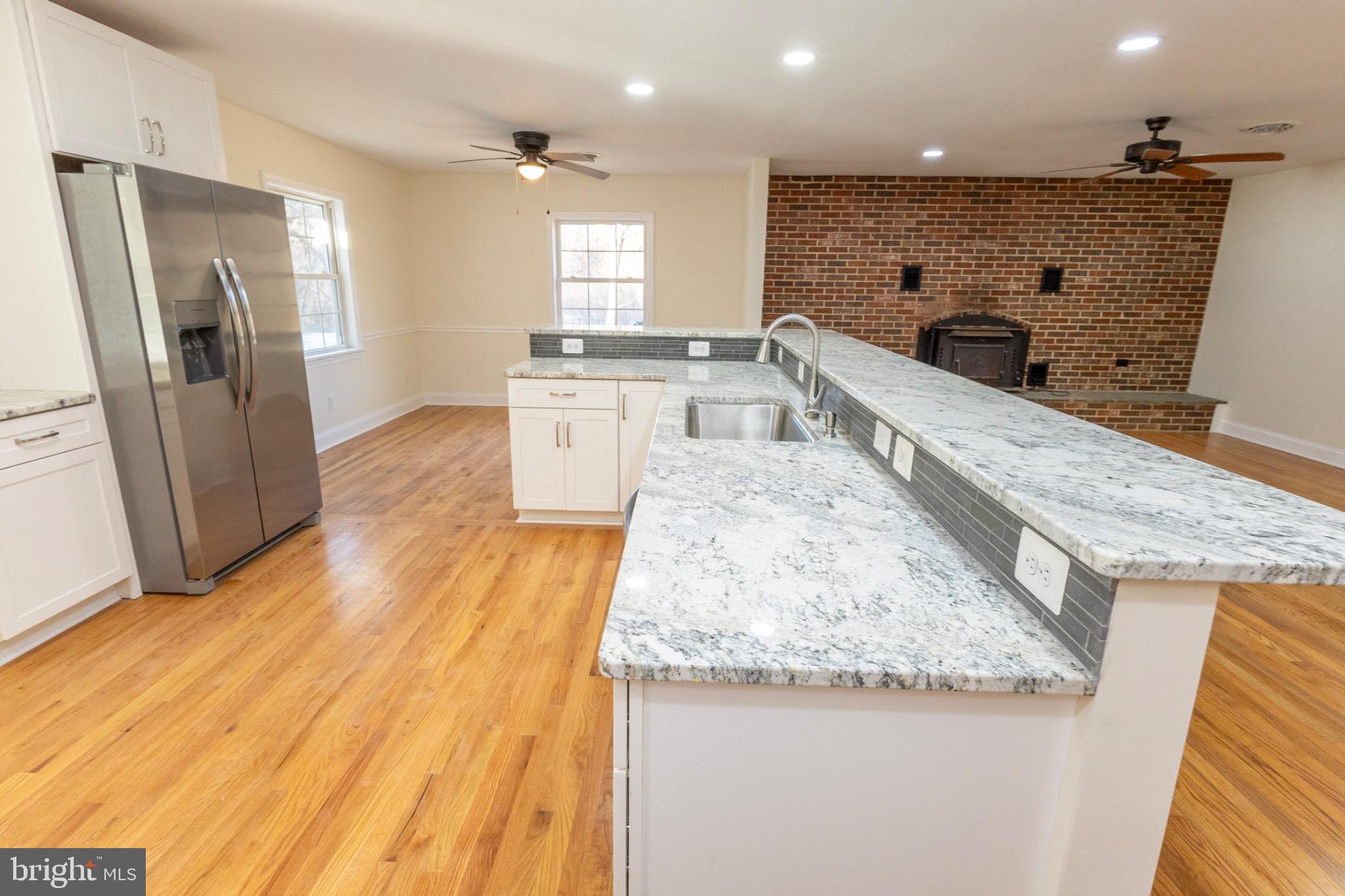 49151 Wynne Road Ridge, MD 20680 - Photo 16 of 80 Modern kitchen with elegant finishes.