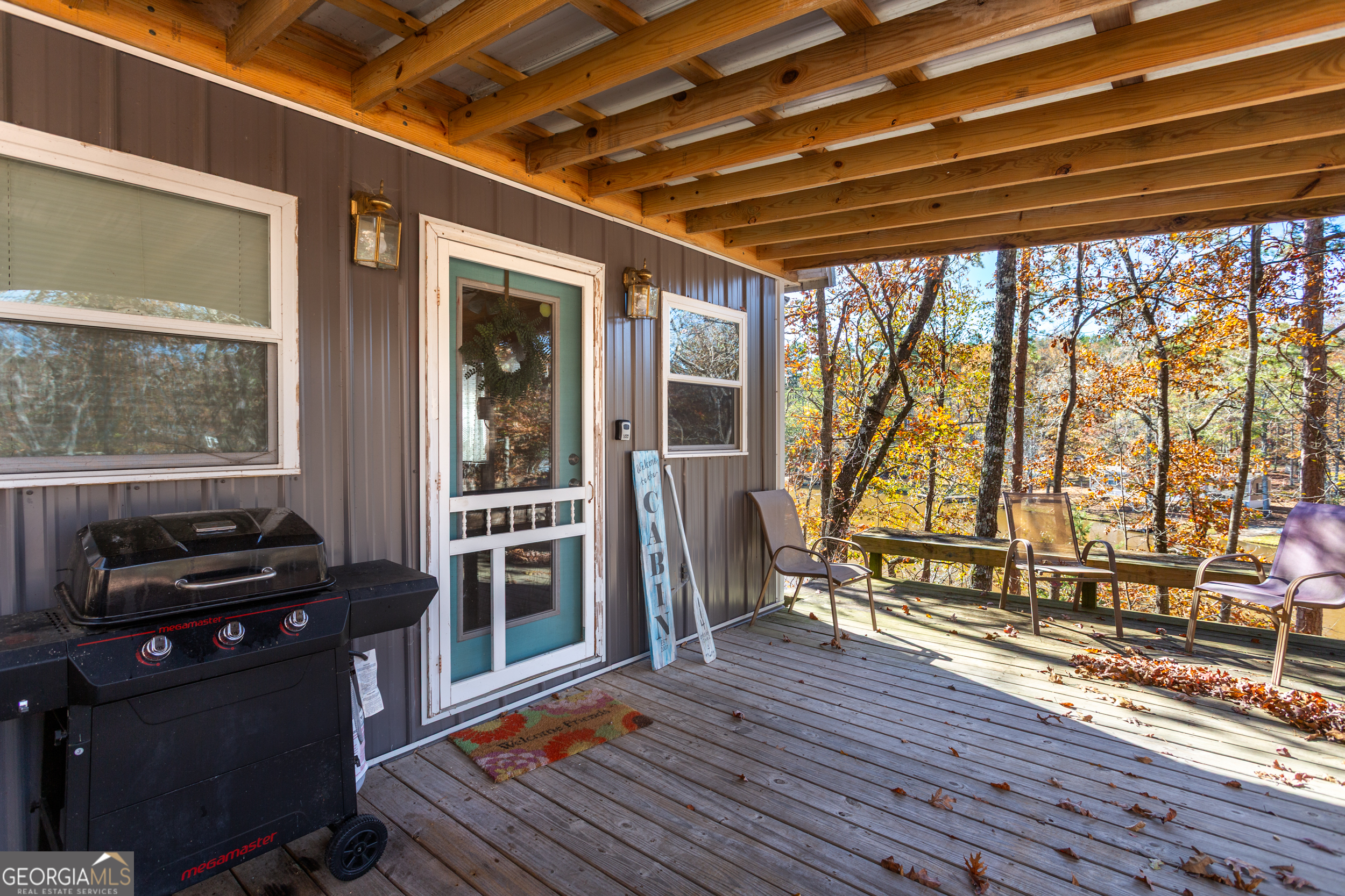 114 Lakeside Circle Delta, AL 36258 - Photo 14 of 22 a view of a balcony with wooden floor