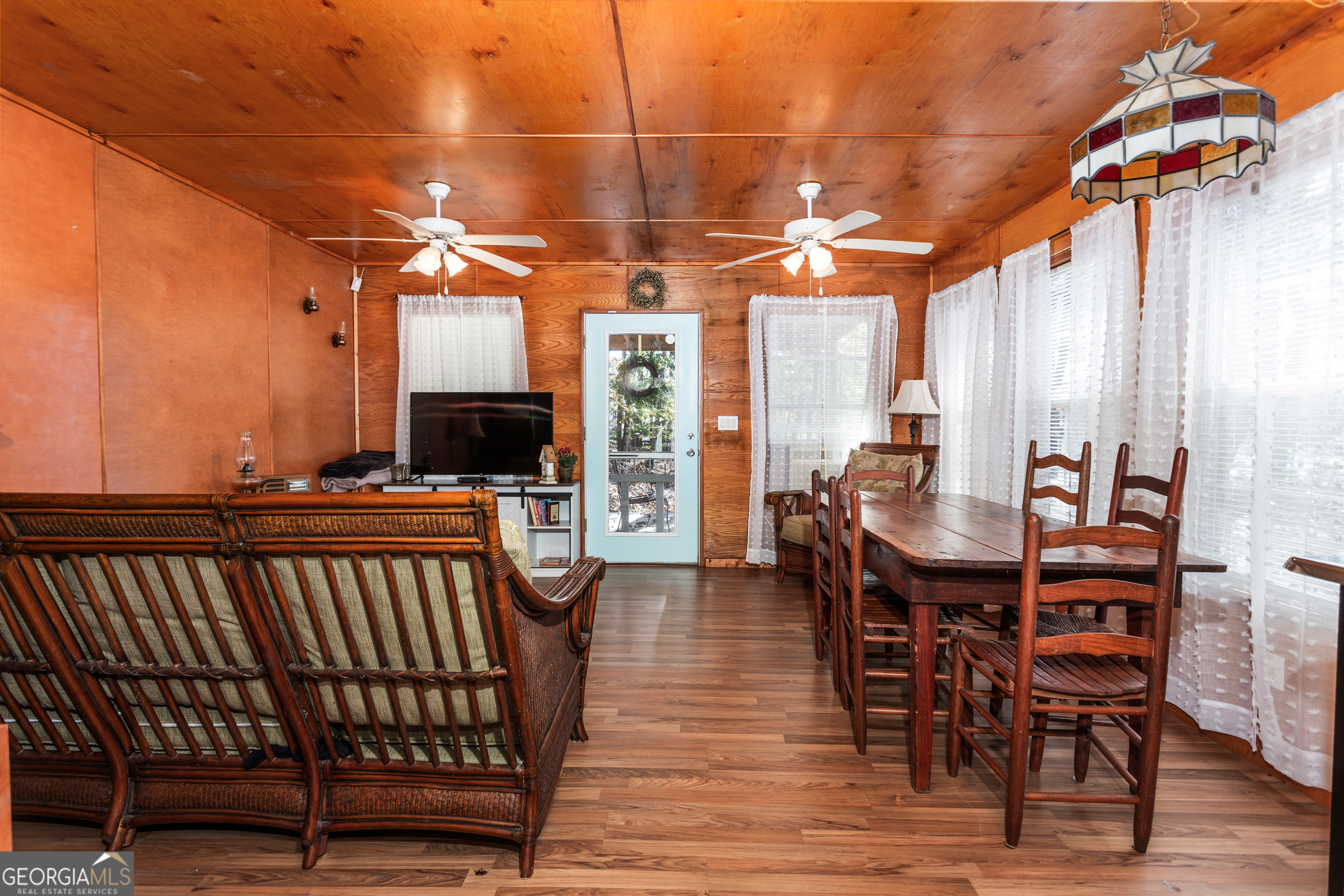 114 Lakeside Circle Delta, AL 36258 - Photo 2 of 22 a view of a chairs and table in the patio