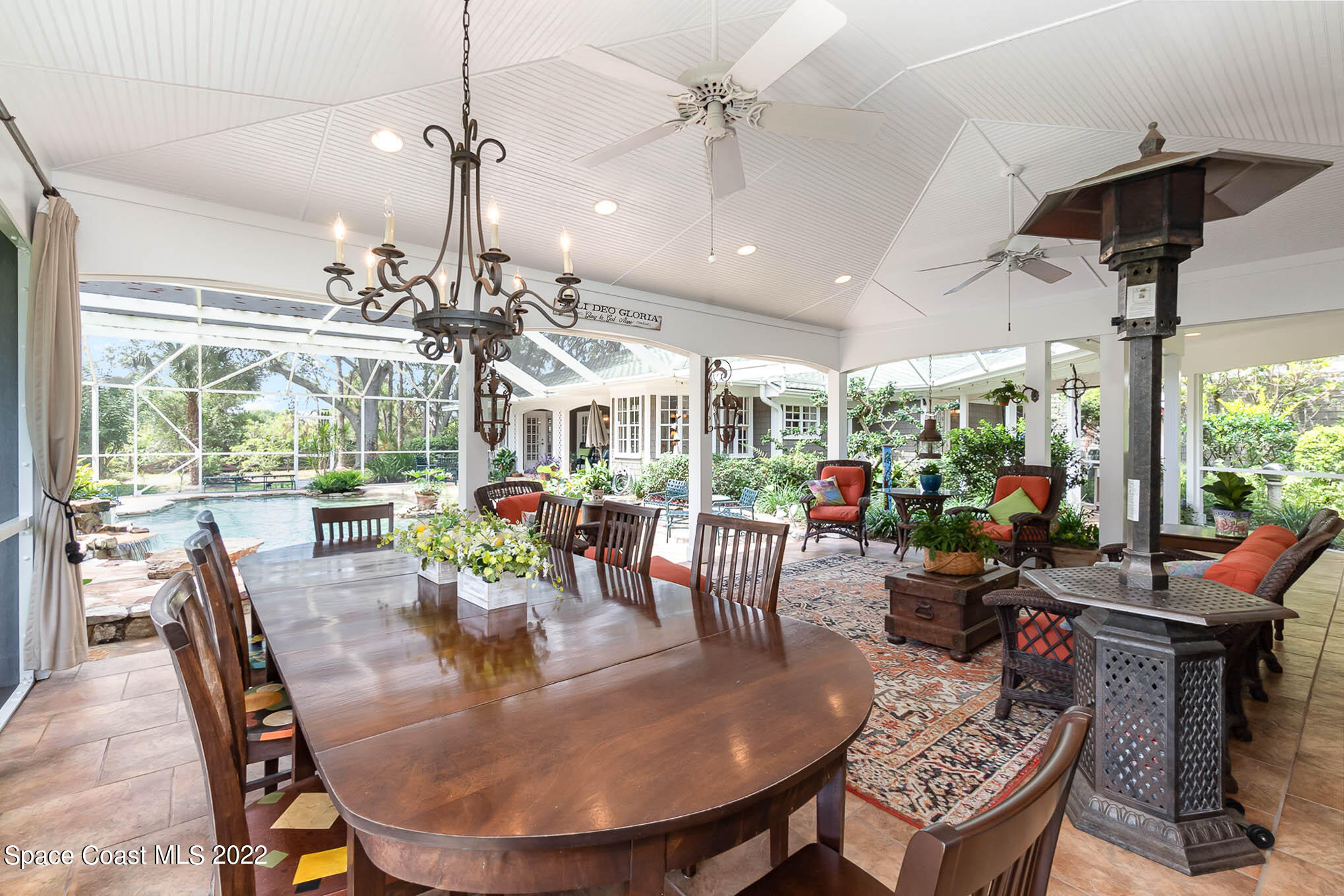 4025 Turtle Mound Road Melbourne, FL 32934 - Photo 17 of 54 a view of a dining room with furniture window and outside view