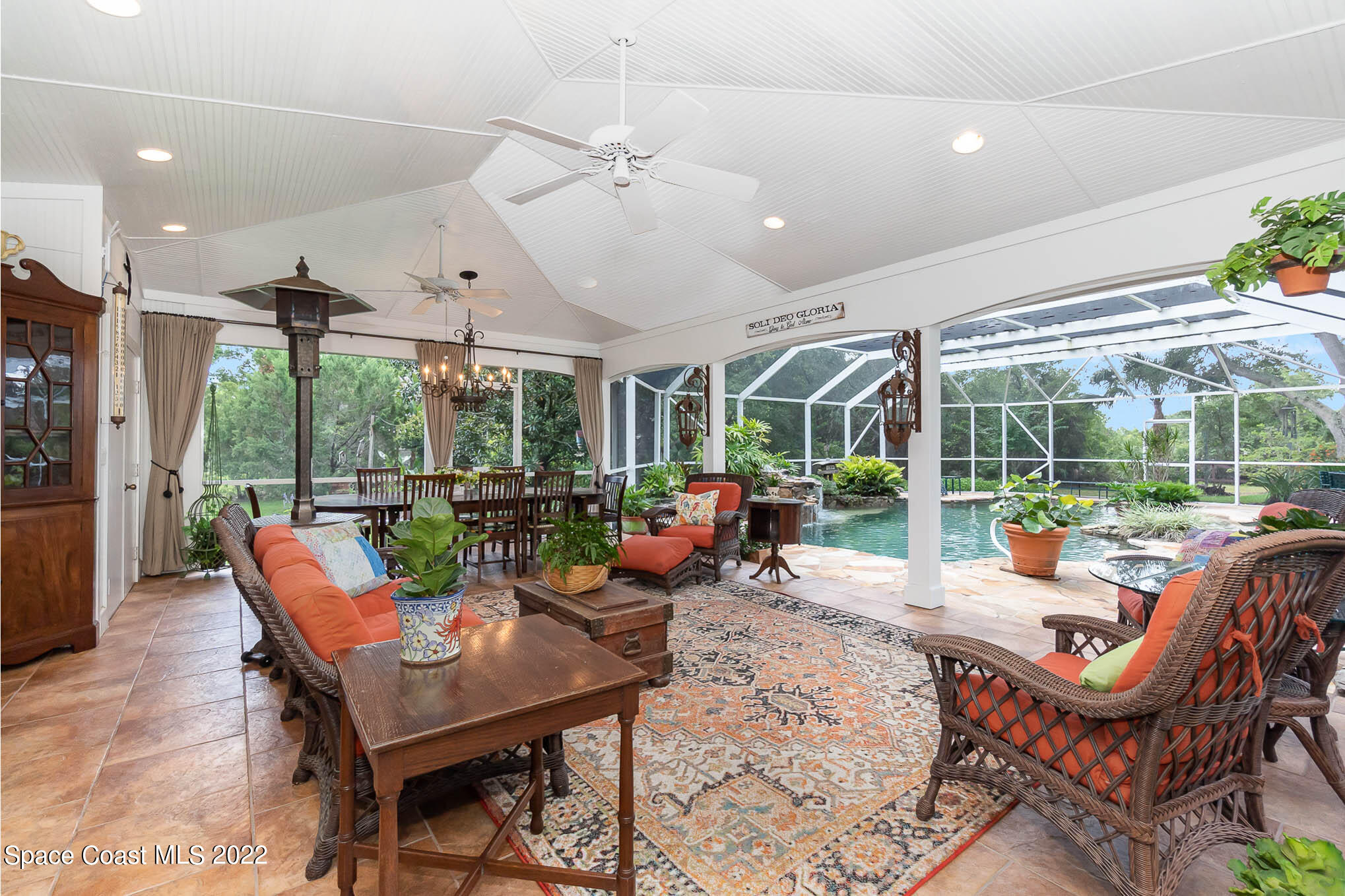4025 Turtle Mound Road Melbourne, FL 32934 - Photo 18 of 54 a living room with furniture and a large window