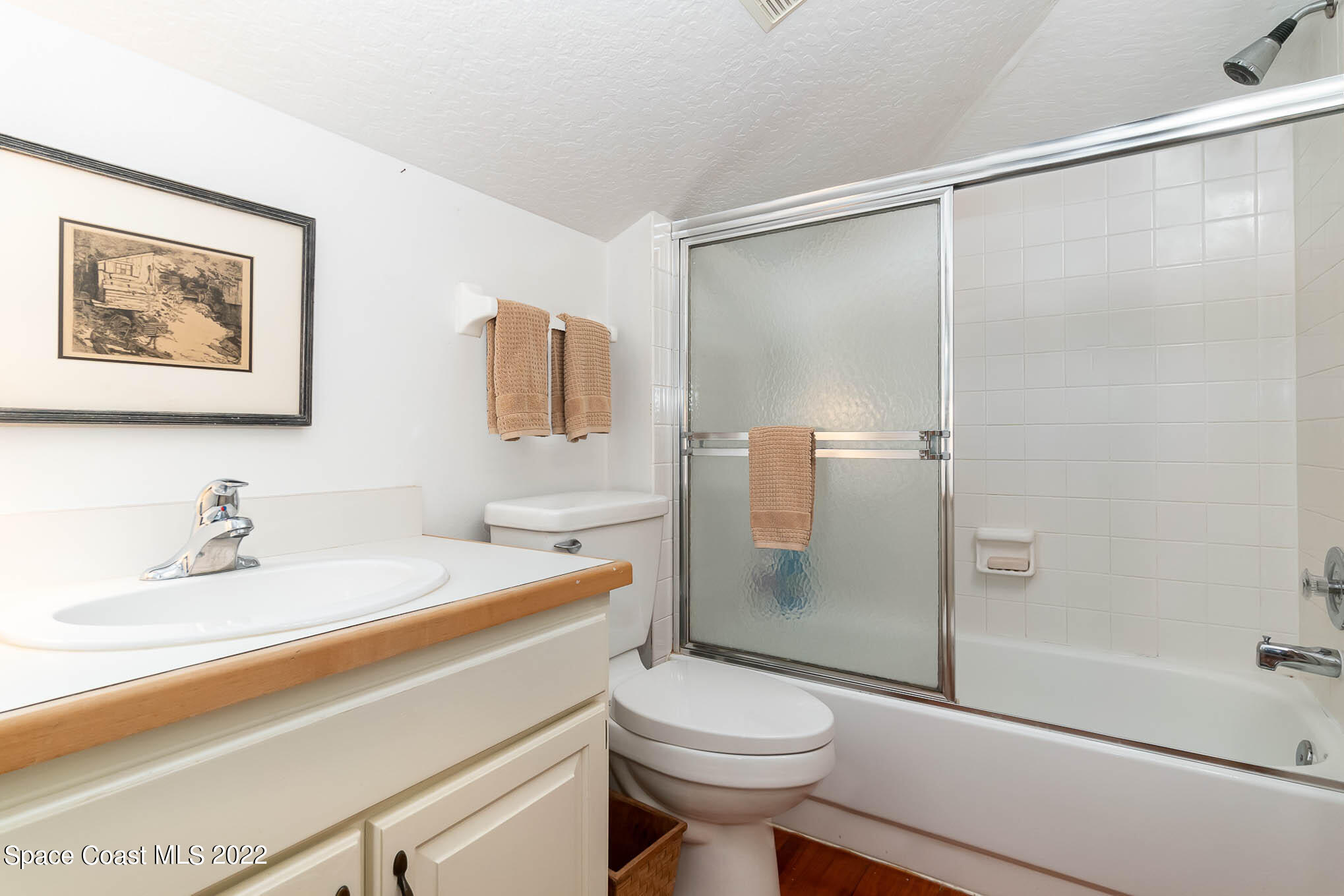 4025 Turtle Mound Road Melbourne, FL 32934 - Photo 47 of 54 a bathroom with a sink toilet and shower