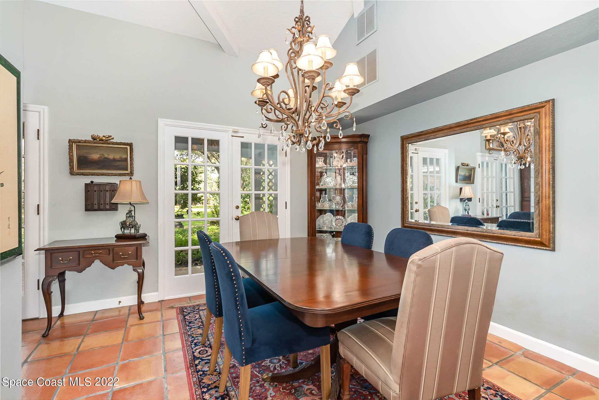 4025 Turtle Mound Road Melbourne, FL 32934 - Photo 8 of 54 a view of a dining room with furniture window and wooden floor