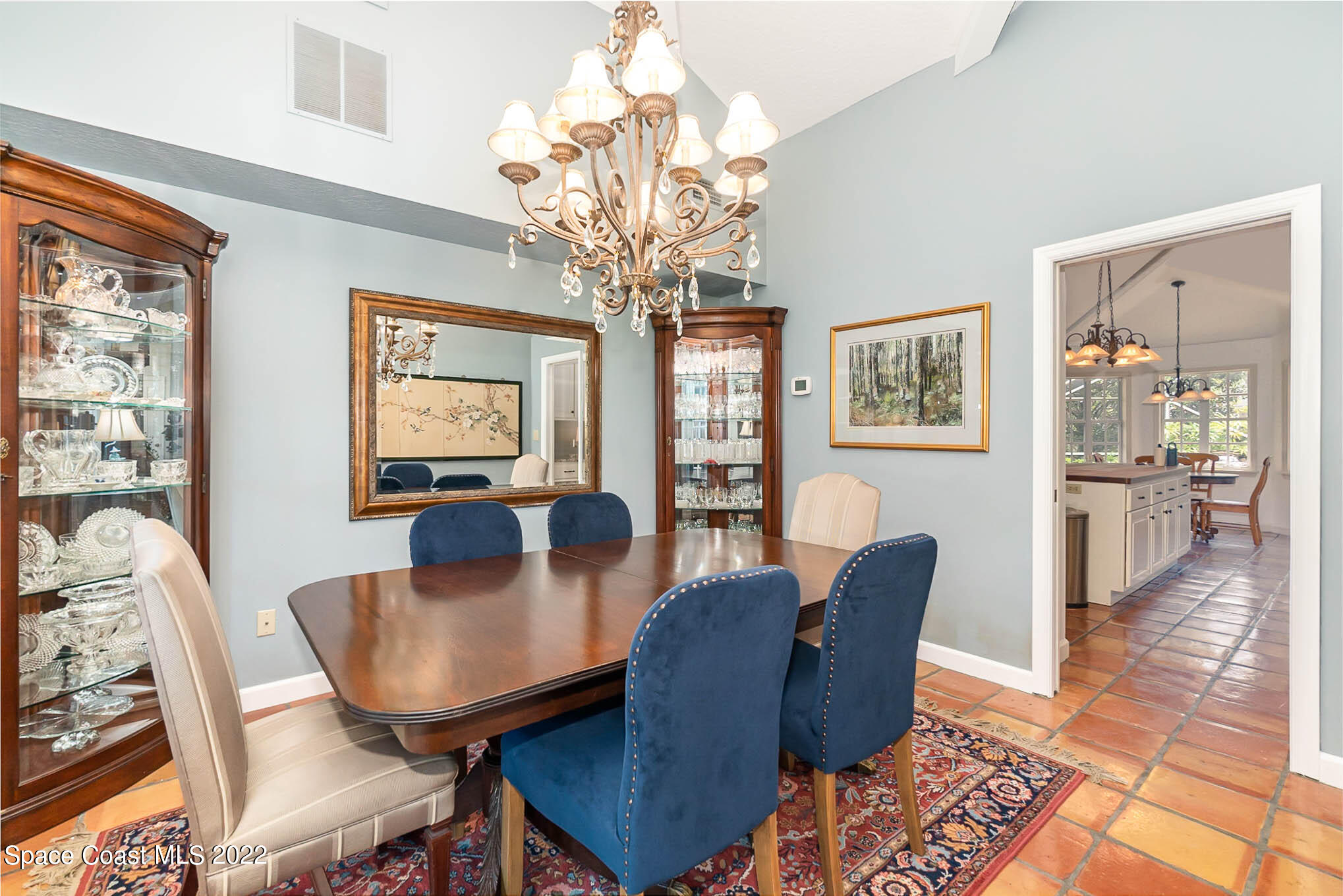 4025 Turtle Mound Road Melbourne, FL 32934 - Photo 9 of 54 a view of a dining room with furniture window and wooden floor