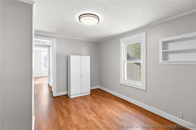 an empty room with windows