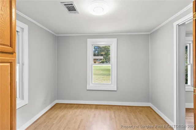 a view of a room that has a window in it