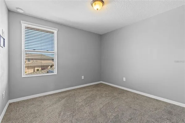 an empty room with window
