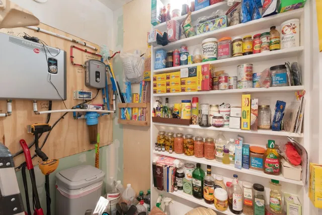 a room with lots of different kinds of food