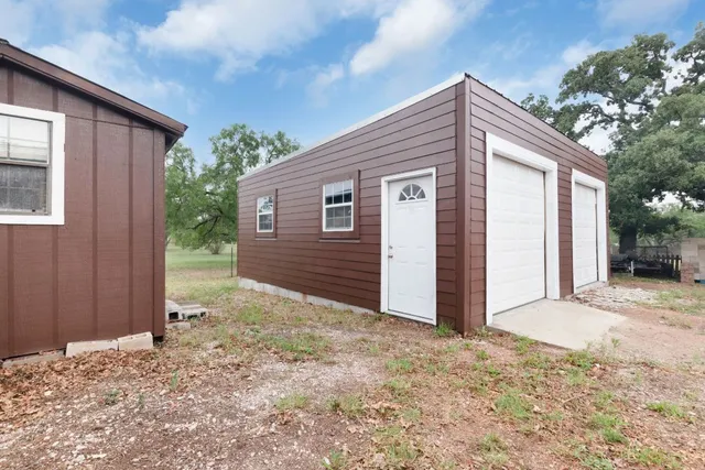 a view of backyard of house