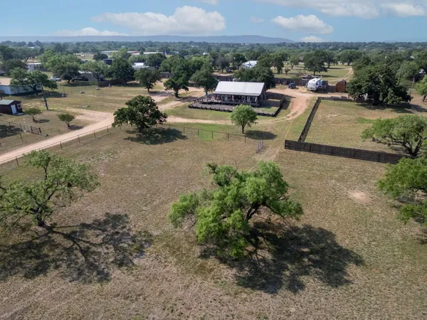 an aerial view of a house and pool table