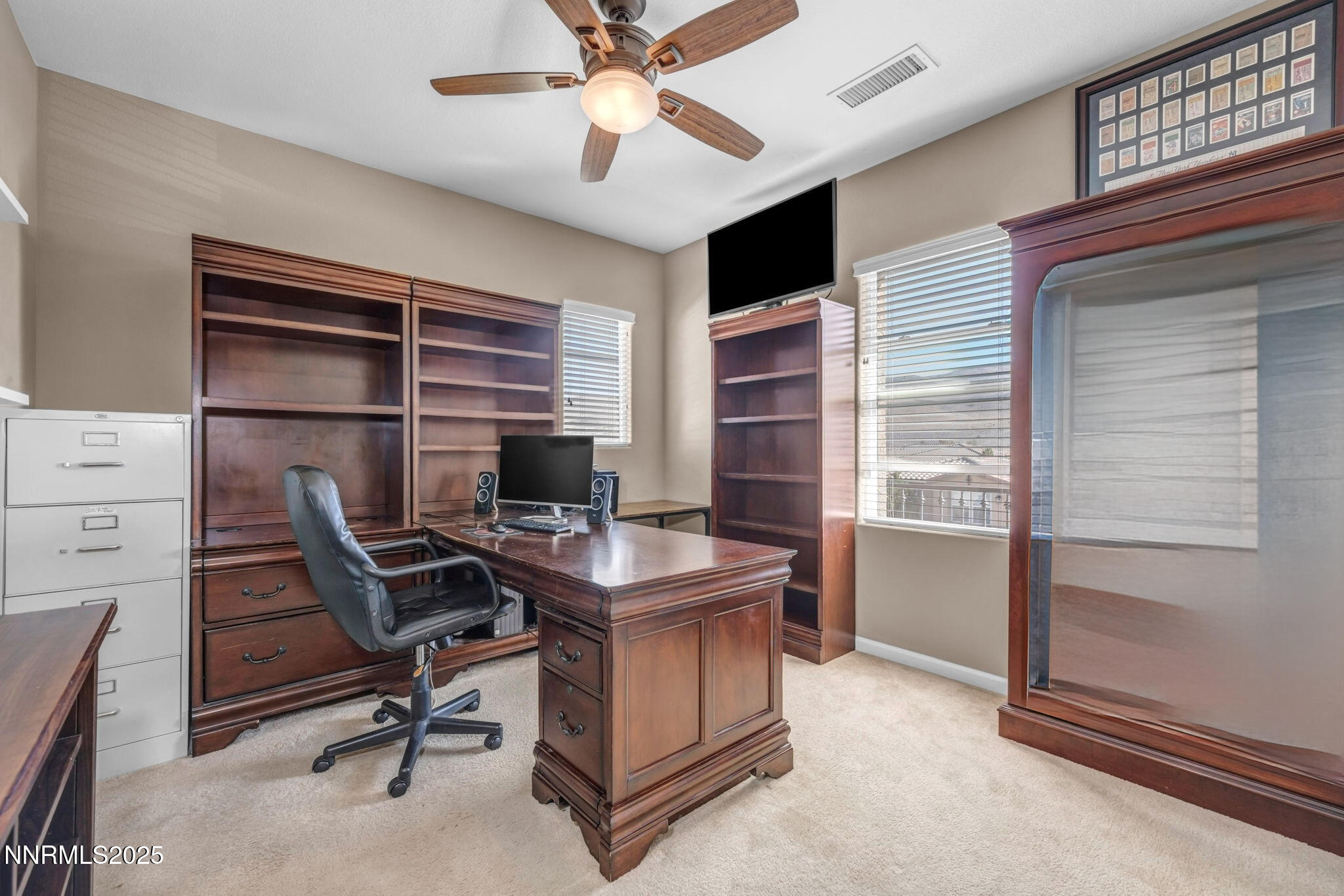 9845 Copenhagen Way Reno, NV 89521 - Photo 32 of 57 a view of a workspace with furniture