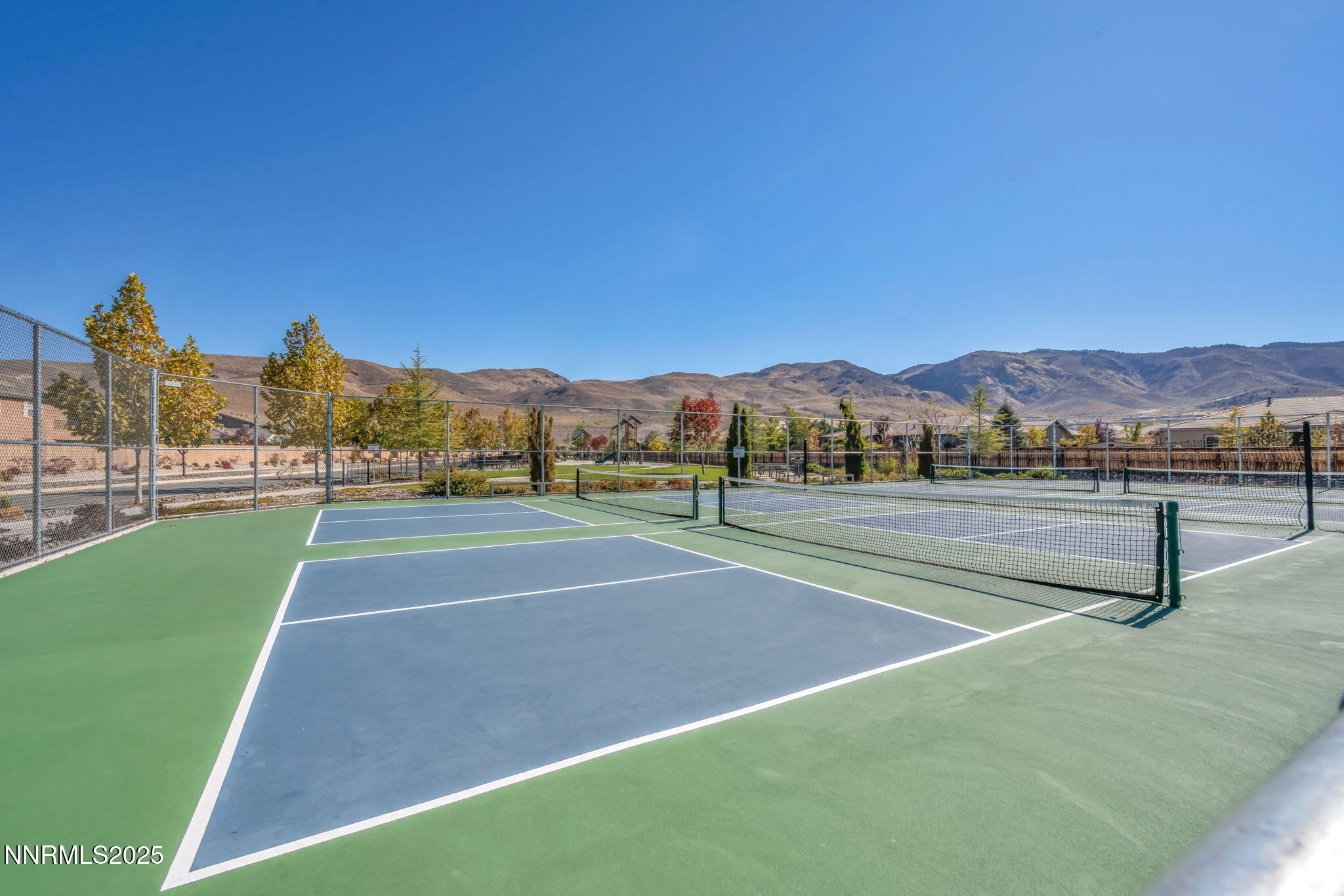 9845 Copenhagen Way Reno, NV 89521 - Photo 44 of 57 a view of an outdoor space and tennis court