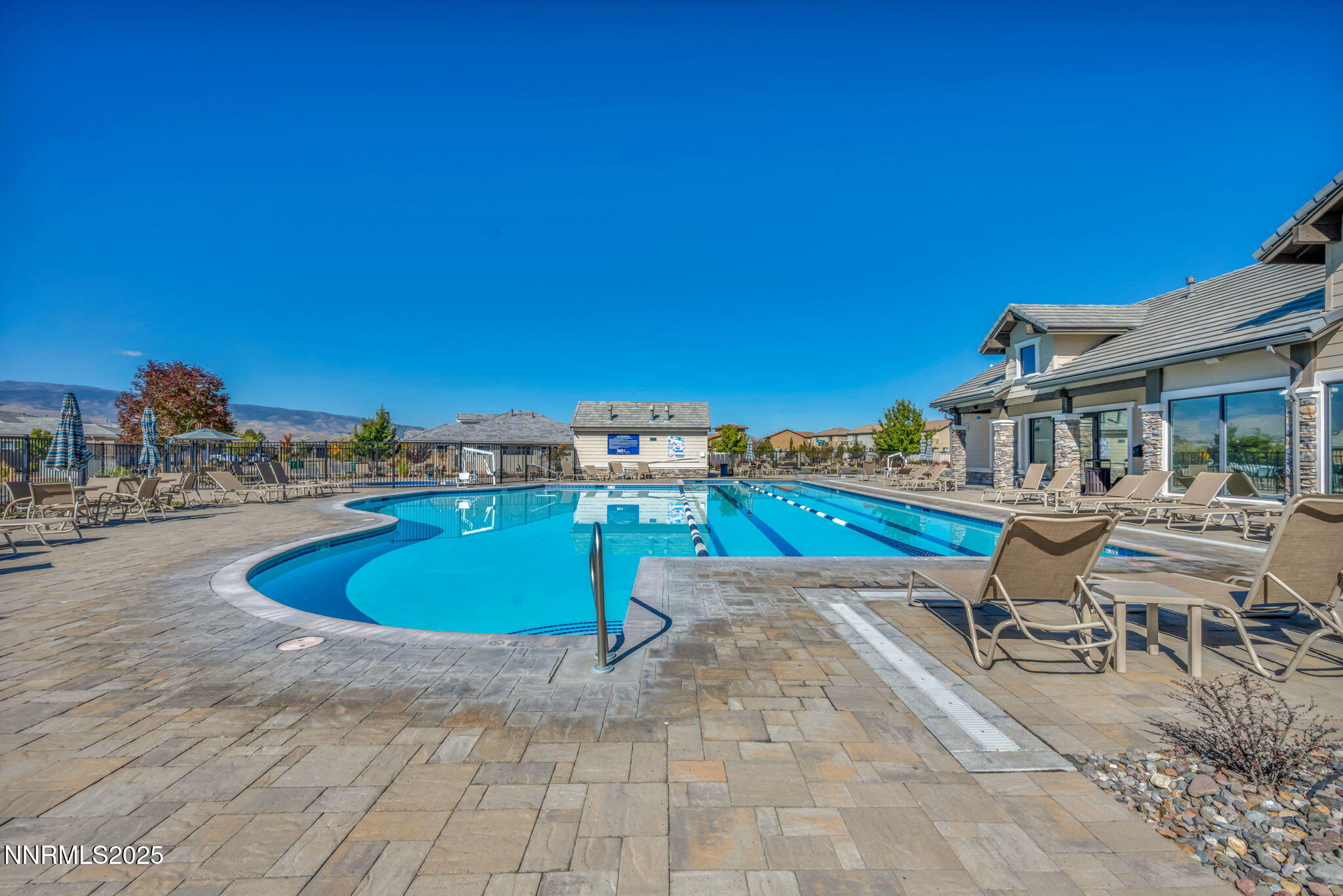 9845 Copenhagen Way Reno, NV 89521 - Photo 47 of 57 a swimming pool with outdoor seating and yard