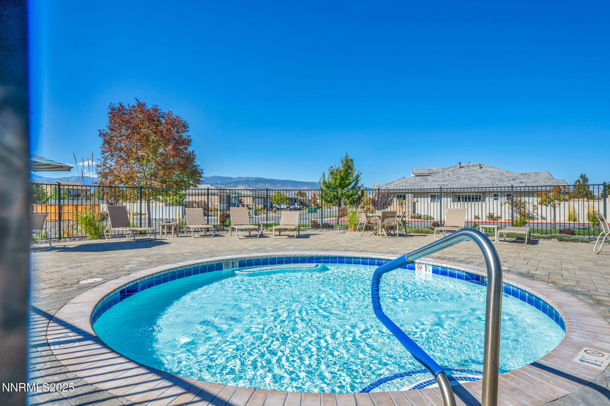 9845 Copenhagen Way Reno, NV 89521 - Photo 50 of 57 a view of a swimming pool with a patio