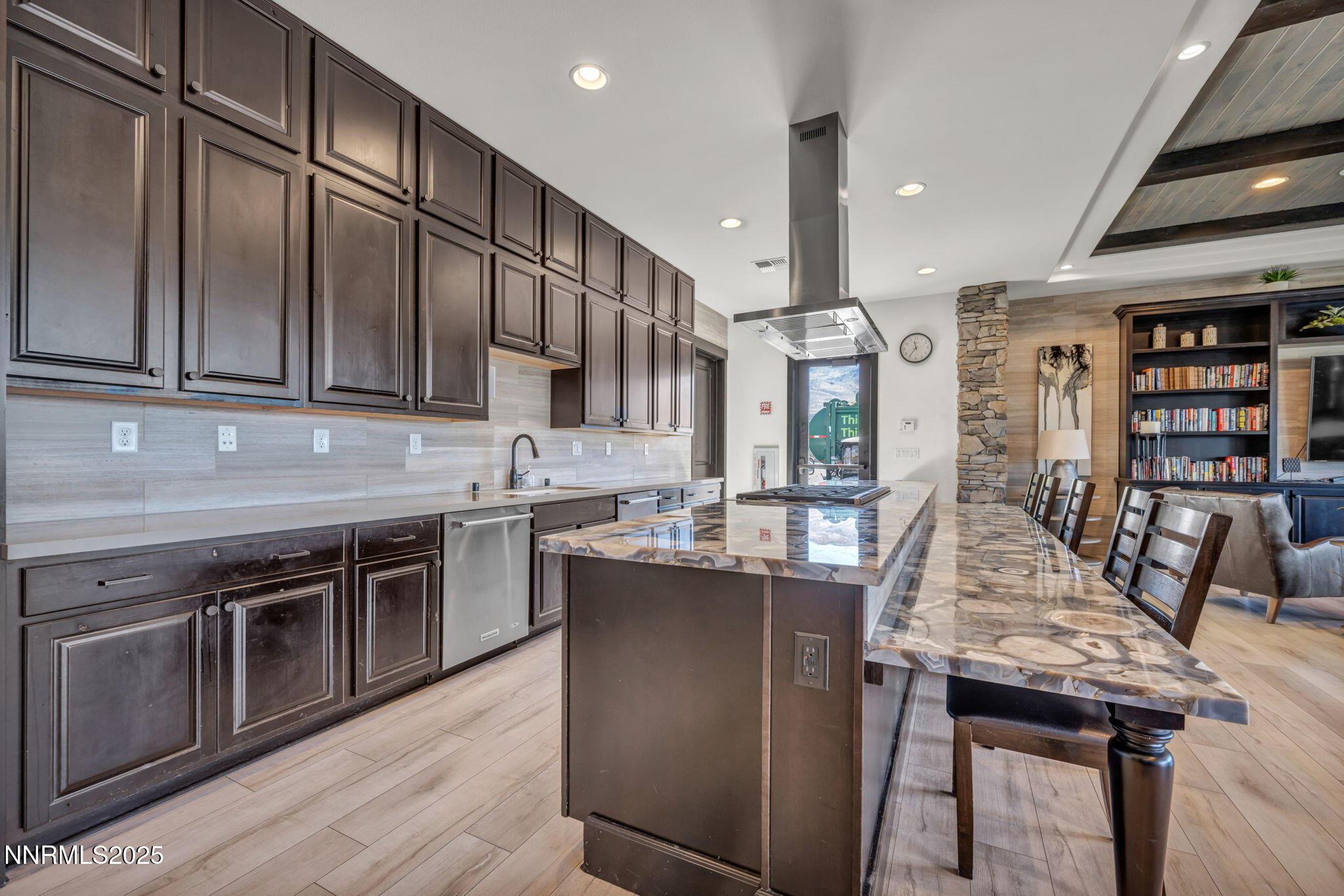 9845 Copenhagen Way Reno, NV 89521 - Photo 56 of 57 a kitchen with stainless steel appliances granite countertop a stove sink and cabinets