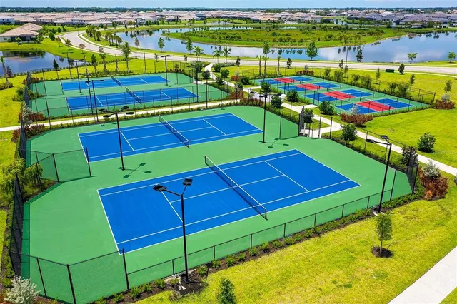 a aerial view of a yard tables chairs and pool