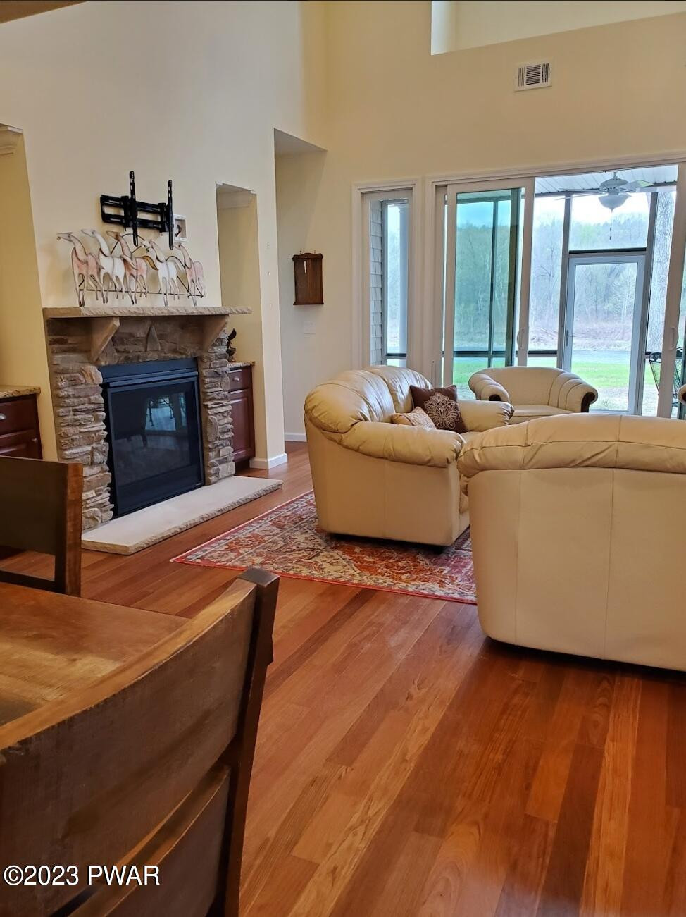 806 MacIntosh Way Matamoras, PA 18336 - Photo 18 of 53 a living room with furniture and a fireplace