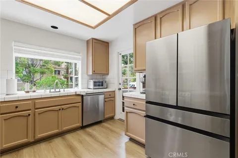 $1,085,000 | 7767 Caminito Monarca, Unit 100, Carlsbad, CA 92009