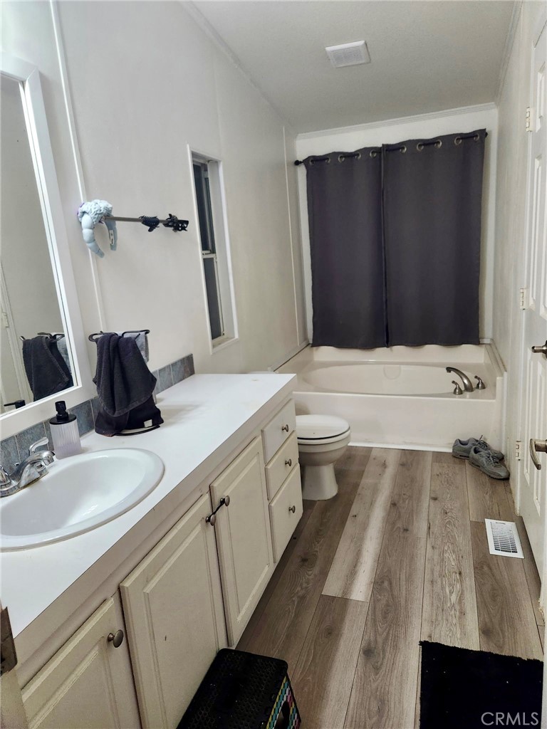 13139 Zane Way Whitewater, CA 92282 - Photo 11 of 11 a bathroom with a double vanity sink and mirror