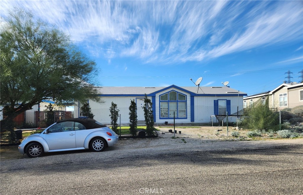 13139 Zane Way Whitewater, CA 92282 - Photo 2 of 11 a car parked in front of a house