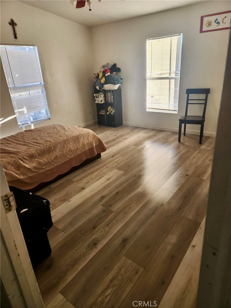 13139 Zane Way Whitewater, CA 92282 - Photo 7 of 11 a bedroom with a bed and a window
