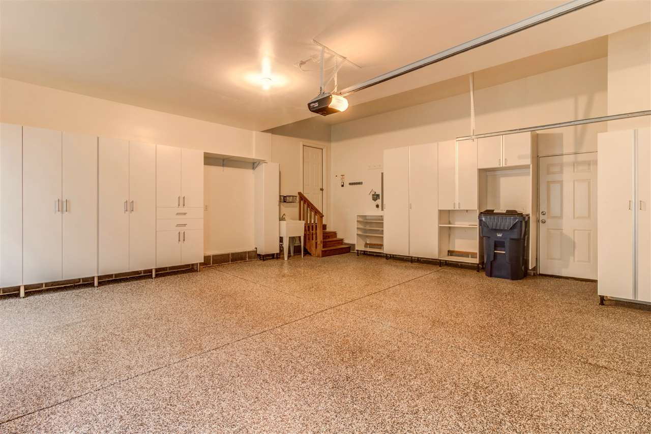 2100 Stanton Hall Court Raleigh, NC 27614 - Photo 23 of 25 Garage Floor and Walls Finished and Painted. Multiple Storage Cabinets! Garage