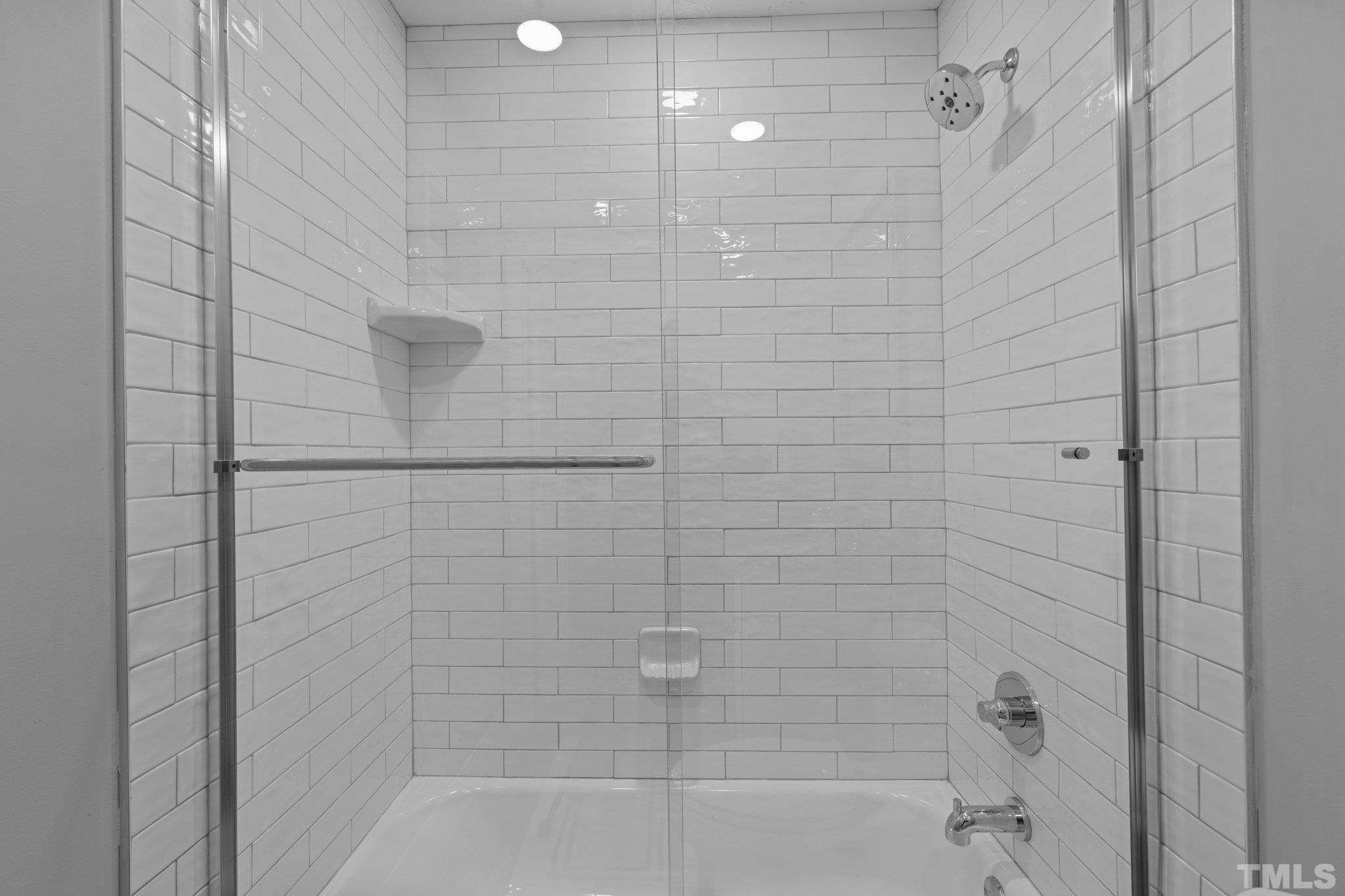 535 Cooper Road Raleigh, NC 27610 - Photo 8 of 13 a bathroom with a shower