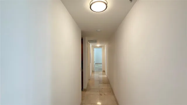 a view of an entryway with garden